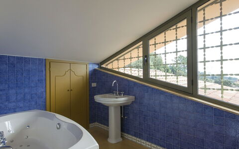 Delfina: Bathroom, Blue, Property, Room, Tile, Architecture, Bathtub, Wall, Interior Design, Floor