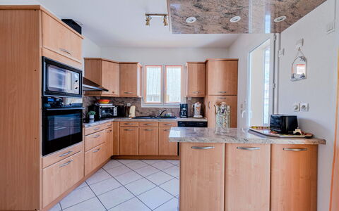 Ladine: Cabinetry, Countertop, Property, Kitchen, Kitchen Appliance, Wood, Kitchen Stove, Home Appliance, Interior Design, Drawer