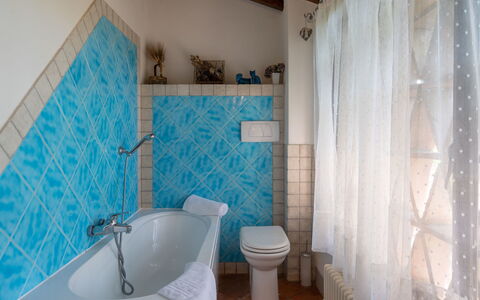 Villa Alba: Bathroom, Property, Room, Blue, Floor, Turquoise, Interior Design, Bathtub, Wall, Curtain