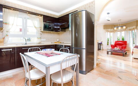 Villa Jazmin: Furniture, Interior Design, Flooring, Floor, Wood, Kitchen, Ceiling, Chair, Lighting, Room