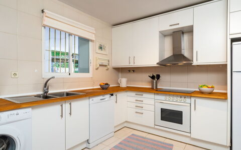 Mirador Ii: Property, Room, Kitchen, Cabinetry, Furniture, Countertop, Yellow, Interior Design, Building, Real Estate