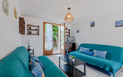 Le Barcarès 545: Furniture, Property, Comfort, Azure, Picture Frame, Table, Interior Design, House, Living Room, Wood