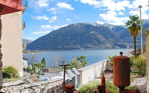 Rossella: Sky, Mountain, Property, Azure, Town, Wilderness, Tourism, Water, Lake, Vacation