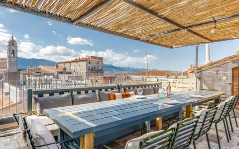 La Porte Génoise: Sky, Cloud, Daytime, Building, Property, Window, Table, Shade, Wood, Chair