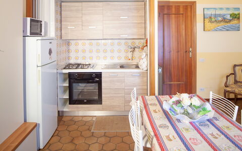 Eveten Apartments - Diano Marina: Room, Property, Furniture, Building, Kitchen, Interior Design, Cabinetry, House, Floor, Real Estate