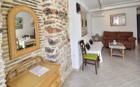 Caseta Blanqueta: Furniture, Property, Mirror, Table, Wood, Cabinetry, Living Room, Interior Design, Yellow, Chair