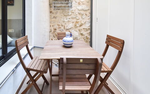 Caseta Blanqueta: Table, Furniture, Property, Building, Chair, Wood, Tableware, Flooring, Outdoor Furniture, Floor
