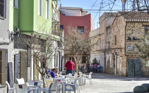 Caseta Blanqueta: Daytime, Window, Building, Table, Sky, Chair, Infrastructure, Tree, Plant, Architecture
