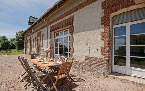 Les Écuries de Callenville: Sky, Furniture, Window, Daytime, Property, Table, Building, Wood, Architecture, Outdoor Furniture
