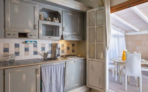 Stella Marina: Countertop, Room, Cabinetry, Furniture, Property, Kitchen, Interior Design, Building, Yellow, Ceiling