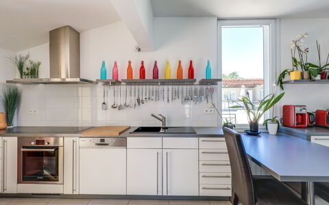 Les Toscanes: Cabinetry, Property, Countertop, Furniture, Bottle, Product, Plant, Kitchen, Wood, Houseplant
