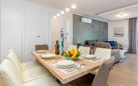 Roko: Room, Property, Furniture, Dining Room, Interior Design, Table, Building, Living Room, Floor, Ceiling