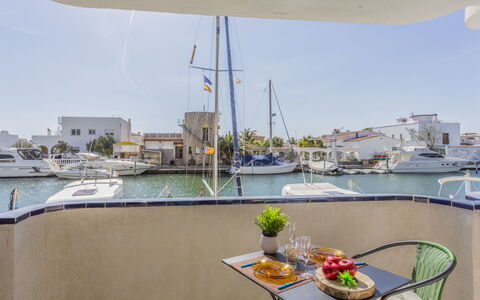 Symar: Water, Boat, Sky, Watercraft, Building, Naval Architecture, Table, Vehicle, Chair, Body Of Water