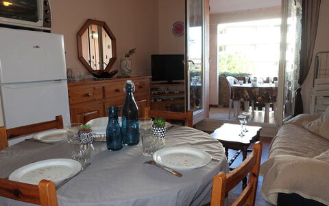 Le Méditerranée: Table, Furniture, Property, Cabinetry, Mirror, Chair, Tableware, Wood, Bottle, Interior Design