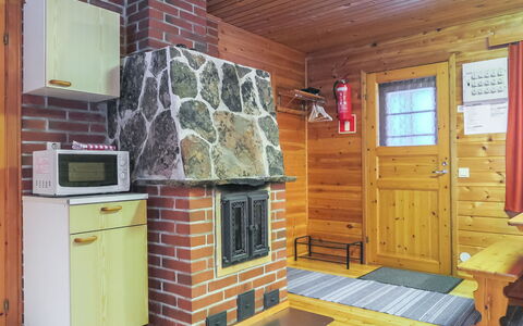 Lemmenliekki 2: Wood, Furniture, Cottage, Room, Wood Stain, Log Cabin, Hardwood, Stove, Chair, Home Appliance