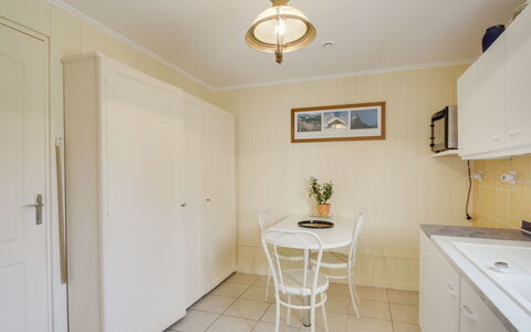 Les Genêts: Property, Table, Houseplant, Wood, Lighting, Chair, Plant, Cabinetry, Architecture, House