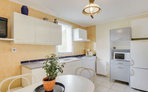 Les Genêts: Cabinetry, Countertop, Furniture, Property, Plant, Houseplant, Building, Flowerpot, Kitchen, Interior Design