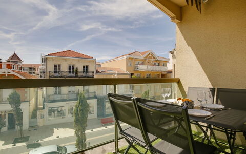 Sun Beach: Cloud, Building, Property, Sky, Daytime, Chair, Table, Window, House, Architecture