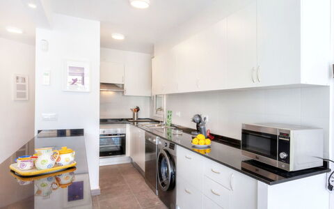 Cap Roig: Property, Room, Kitchen, Furniture, Countertop, Cabinetry, Yellow, Building, Interior Design, Real Estate