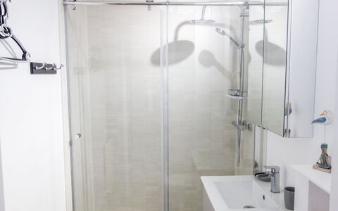 Les Brisants: Shower Panel, Bathroom, Shower, Property, Room, Shower Door, Plumbing Fixture, Tile, Shower Bar, Glass
