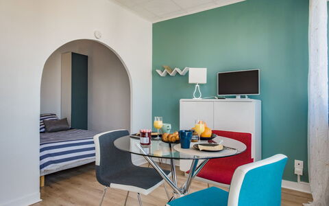 Les Brisants: Room, Furniture, Interior Design, Living Room, Blue, Property, Green, Turquoise, Table, Building