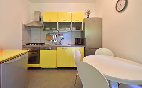 Novi Vinodolski Klenovica 600: Room, Property, Yellow, Furniture, Interior Design, Building, Kitchen, Real Estate, Floor, House