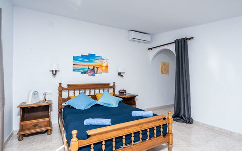Aurelie: Bedroom, Bed, Furniture, Room, Property, Bed Sheet, Bed Frame, Interior Design, Floor, Building