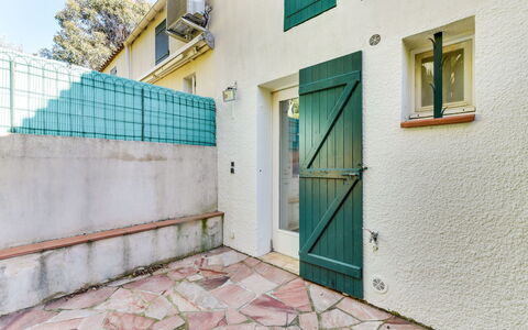 Mas de la Plage: Blue, Property, Green, Turquoise, Wall, Yellow, House, Architecture, Real Estate, Building