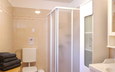 Rustico Nurell: Flooring, Floor, Wall, Interior Design, Wood, Plumbing Fixture, Room, Ceiling, Bathroom, Lighting