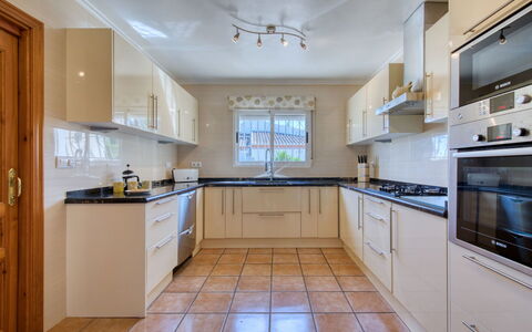 Villa Meena: Property, Room, Countertop, Cabinetry, Kitchen, Furniture, Building, Interior Design, Floor, Real Estate