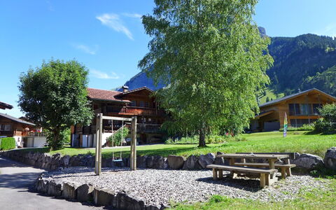 Kandersteg 310: Plant, Sky, Property, Building, Nature, Tree, Shade, Mountain, Natural Landscape, Outdoor Bench