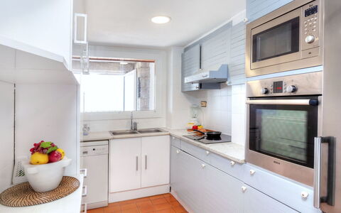 Albatros: Property, Room, Furniture, Kitchen, Cabinetry, Building, Interior Design, Countertop, House, Yellow