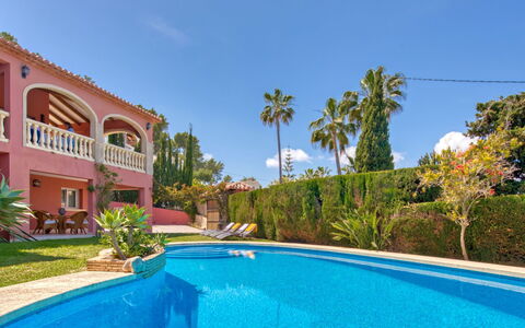 Chill Out on the Sea: Water, Plant, Sky, Building, Swimming Pool, Blue, Azure, Tree, Window, Cloud