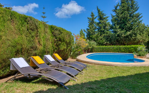 Chill Out on the Sea: Sky, Cloud, Water, Plant, Swimming Pool, Natural Landscape, Outdoor Furniture, Shade, Land Lot, Sunlounger