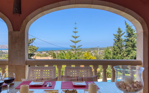 Chill Out on the Sea: Sky, Tableware, Table, Furniture, Azure, Shade, Interior Design, Food, Tree, Building