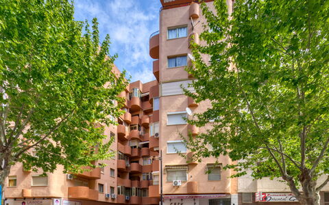 Calpe Pueblo: Sky, Building, Cloud, Tree, Urban Design, Vehicle, Neighbourhood, Tower Block, Window, Condominium