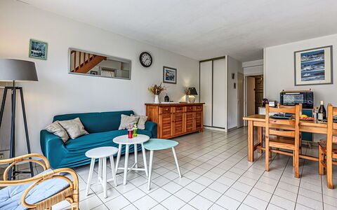 Village du Port: Furniture, Flooring, Floor, Apartment, Interior Design, Chair, Ceiling, Couch, Living Room