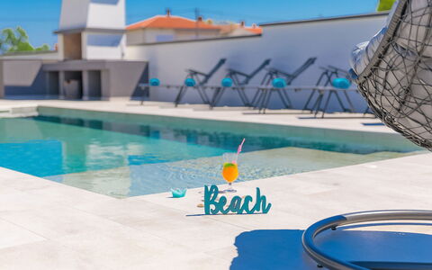 Ella Premantura: Water, Blue, Swimming Pool, Azure, Building, Outdoor Furniture, Sunlounger, Sky, Aqua, Leisure