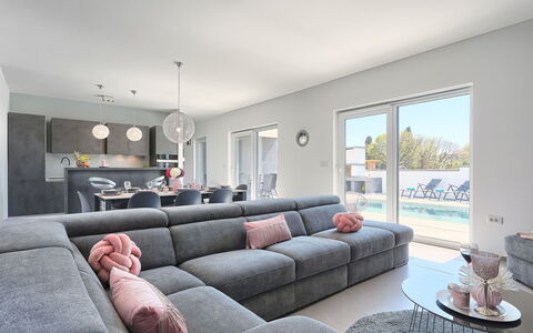 Ella Premantura: Couch, Property, Table, Furniture, Picture Frame, Studio Couch, Living Room, Building, Interior Design, Comfort