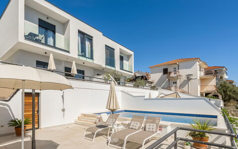 Villa Meri 2: Sky, Property, Building, Plant, Window, Shade, Outdoor Furniture, Urban Design, Condominium, Neighbourhood