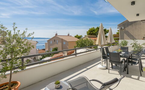 Villa Meri 2: Sky, Cloud, Furniture, Plant, Property, Building, Table, Chair, Flowerpot, Shade