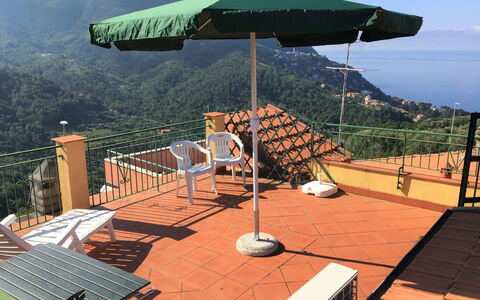 Casale: Sky, Property, Shade, Outdoor Furniture, Cloud, Wood, Mountain, Leisure, Urban Design, Landscape