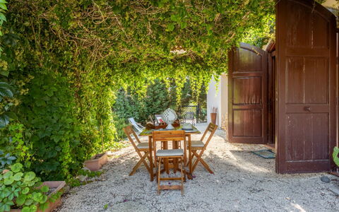 Casale Colomba: Furniture, Table, Building, Chair, Tableware, Cloud, Sky, Tablecloth, Outdoor Furniture, Shade