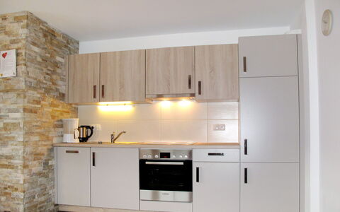 Alpbach 633: Room, Cabinetry, Furniture, Kitchen, Property, Countertop, Floor, Interior Design, Tile, Wall