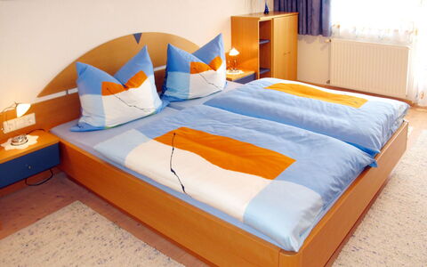 Wildauer: Bed, Furniture, Bed Sheet, Bedding, Mattress, Bedroom, Room, Bed Frame, Orange, Mattress Pad