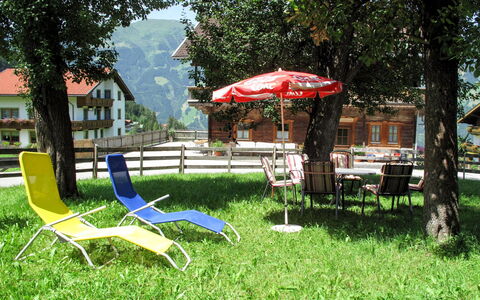 Zell am Ziller 608: Plant, Furniture, Tree, Umbrella, Outdoor Furniture, Shade, Land Lot, Biome, Chair, Leisure
