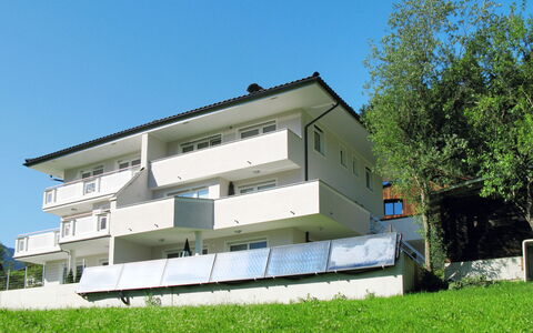 Hanser: Sky, Plant, Building, Window, Tree, Land Lot, Shade, Wood, Urban Design, Facade