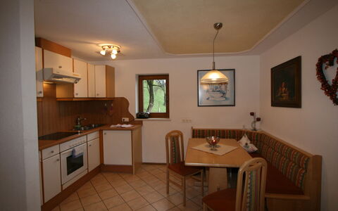 Margit: Property, Furniture, Cabinetry, Picture Frame, Countertop, Wood, Table, Flooring, Chair, Interior Design