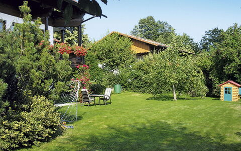 Janik: House, Sky, Property, Natural Landscape, Grass, Lawn, Tree, Yard, Home, Garden