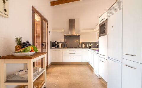 Marinassa: Cabinetry, Furniture, Property, Countertop, Interior Design, Orange, Kitchen, Houseplant, Wood, Plant